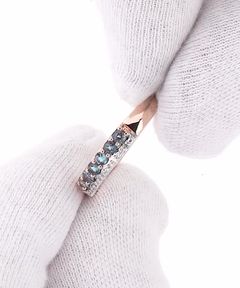 Gold ring with London topazes diamonds