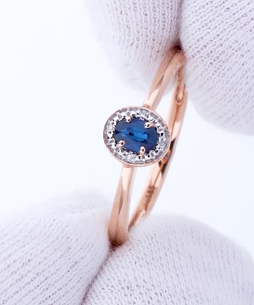 Gold ring with sapphire and diamonds