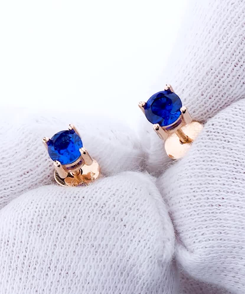 Gold earrings with zircons