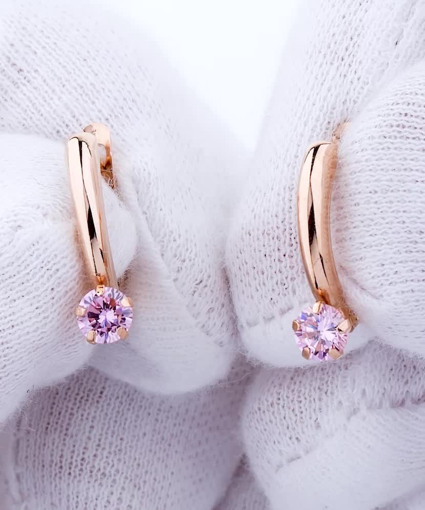 Gold earrings with zircons