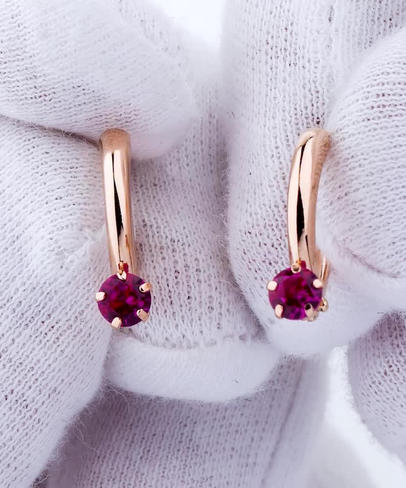 Gold earrings with zircons