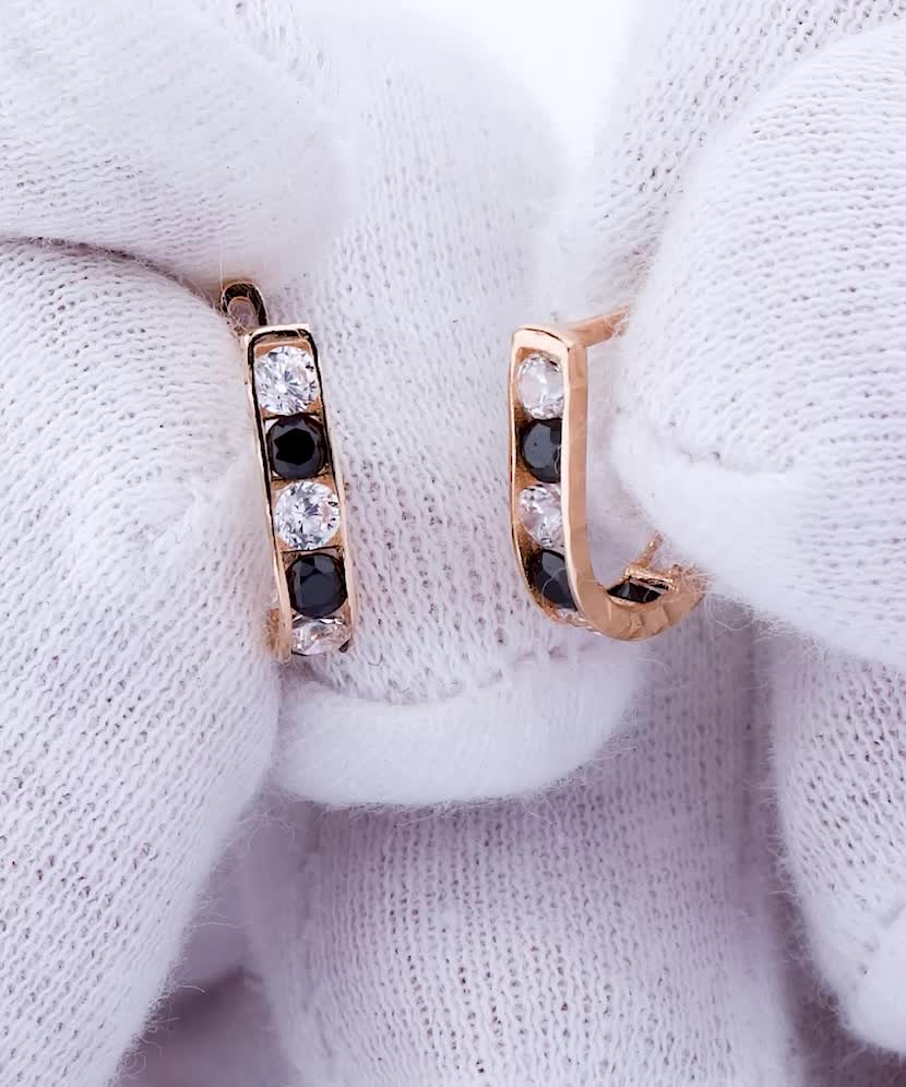 Gold children's earrings with zircons