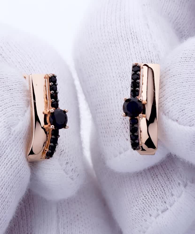 Gold earrings with zircons