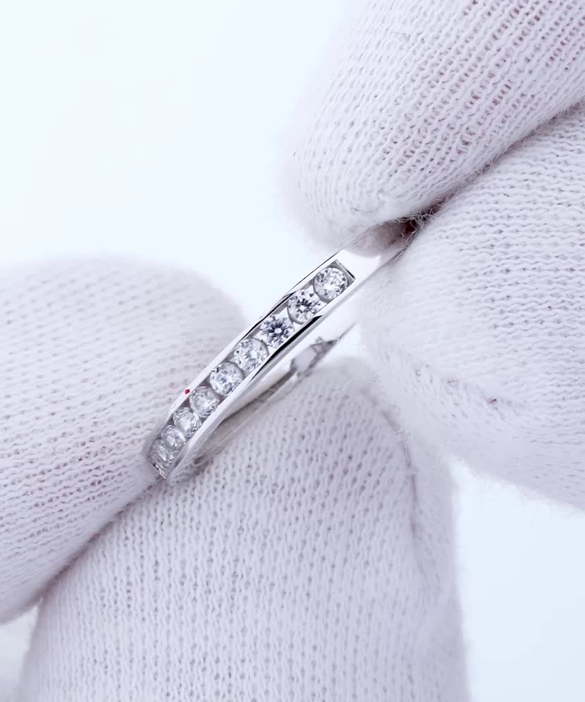 White gold ring with zircons