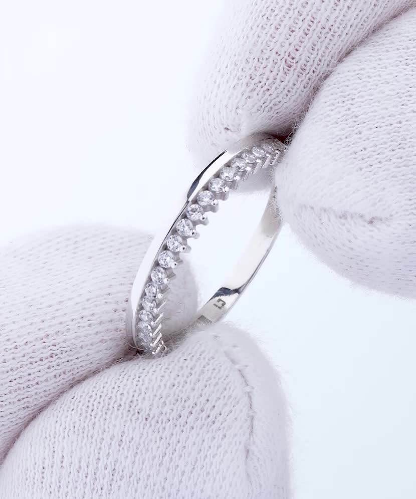 White gold ring with zircons