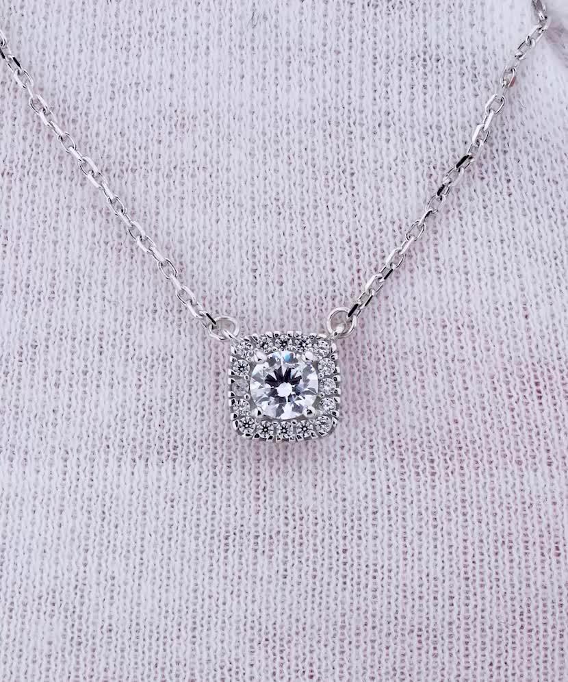 White gold chain with zirconium pendant