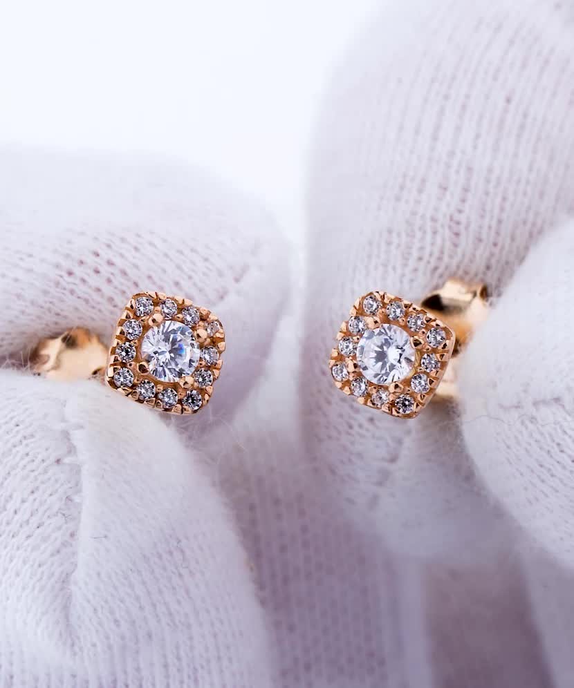 Gold earrings with zircons