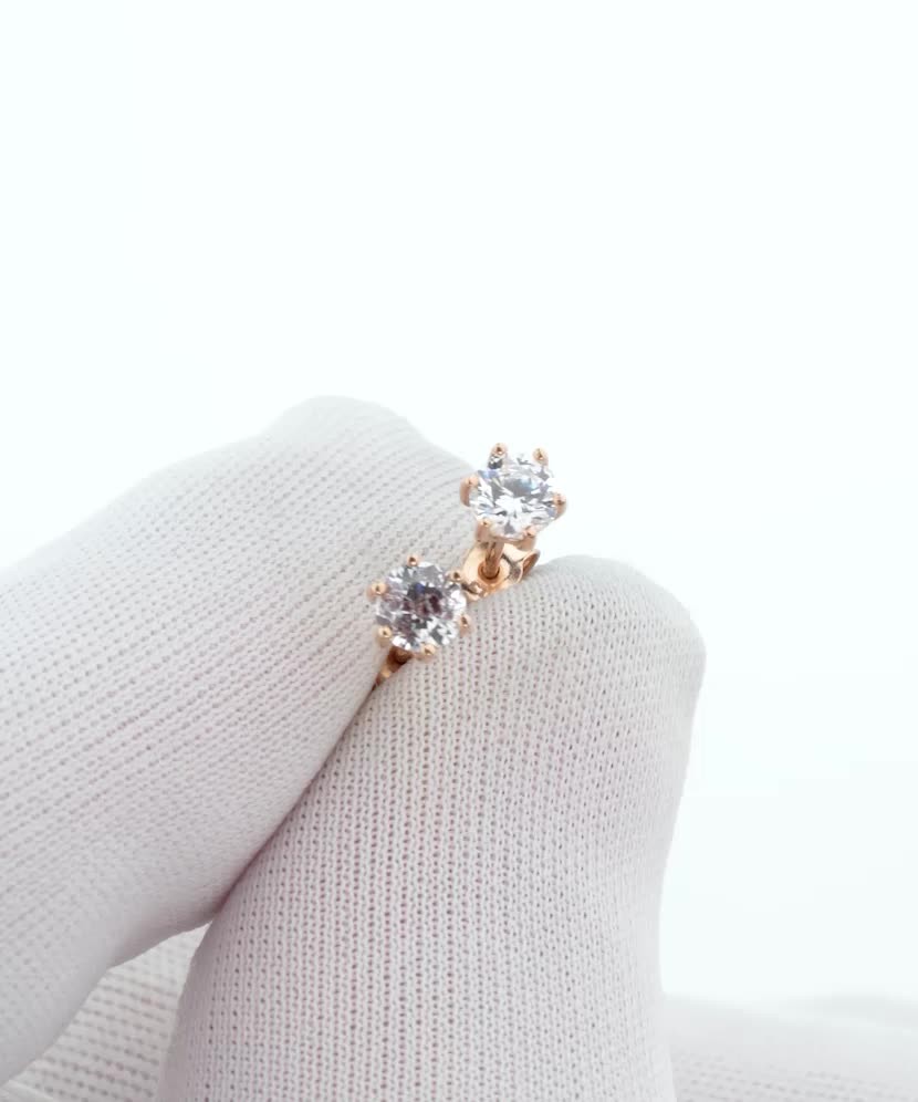 Gold earrings with zircons