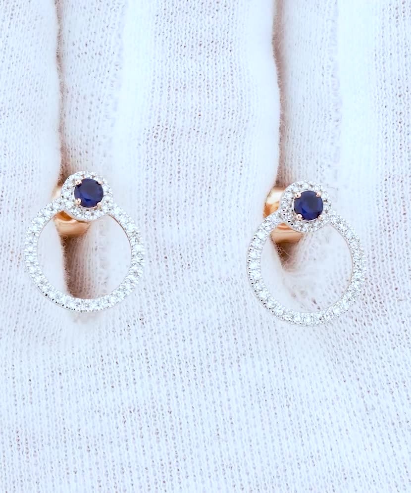 Gold earrings with diamonds and sapphire