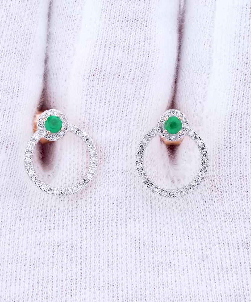 Gold earrings with emeralds and diamonds