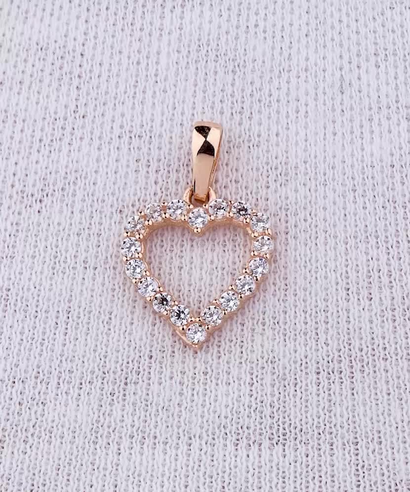 Gold pendant with zircons "heart"