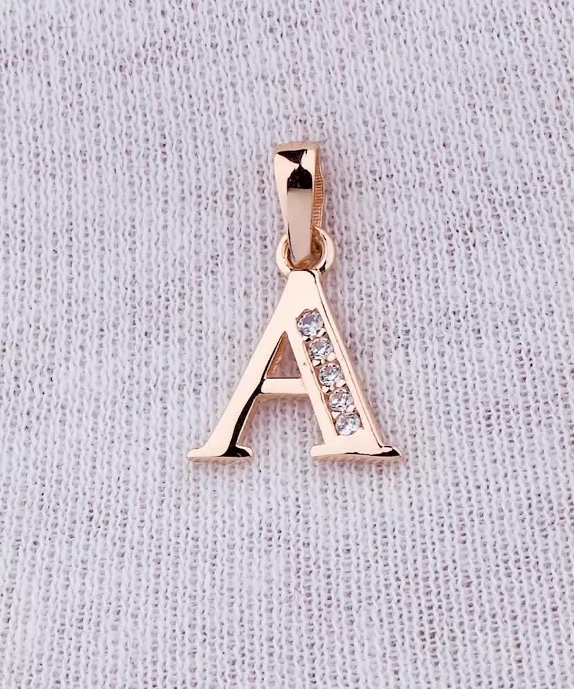 Gold pendant with zircons Letter A