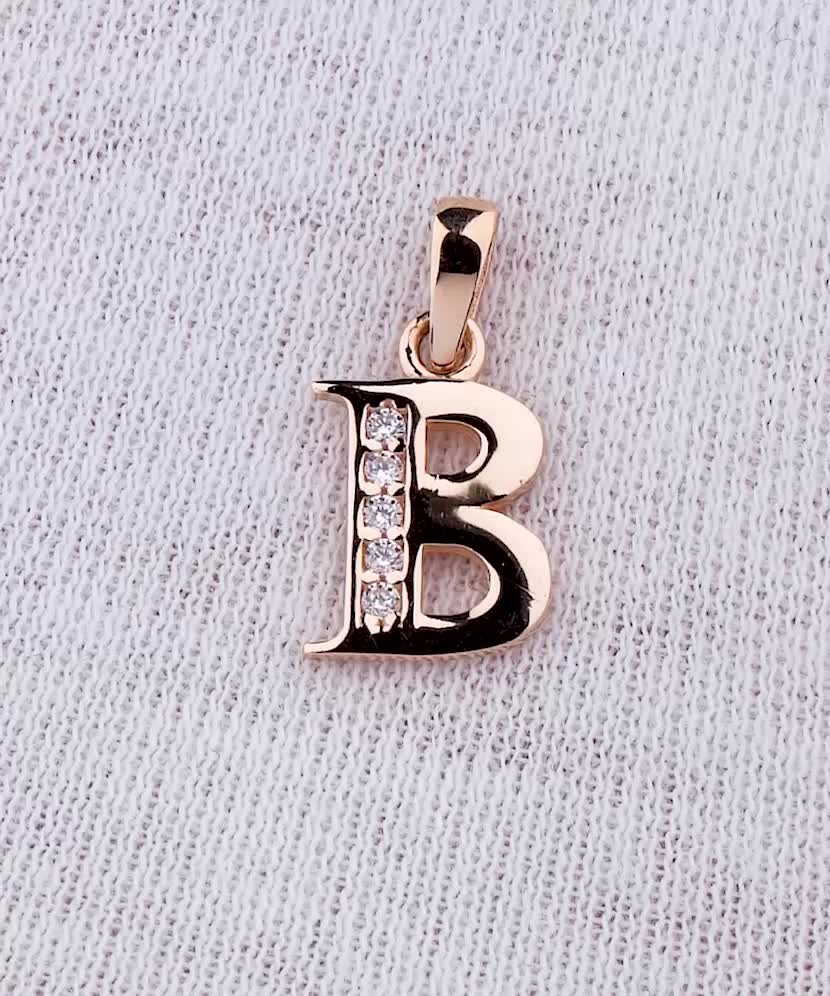 Gold pendant with zircons Letter B