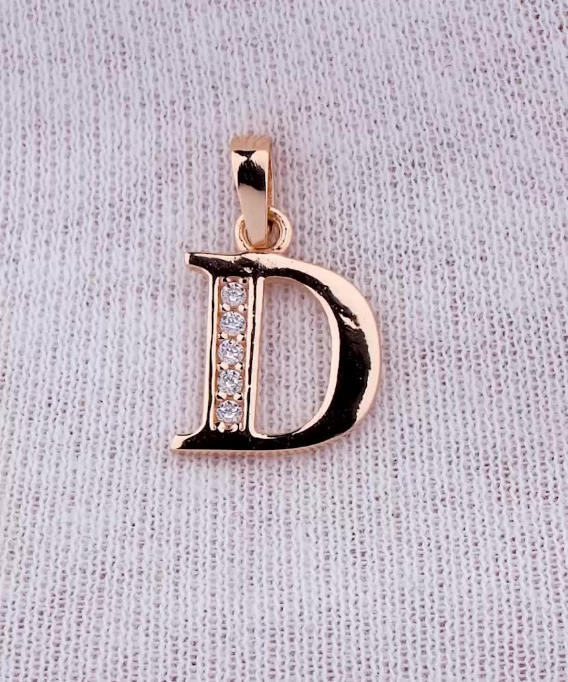 Gold pendant with zircons Letter D