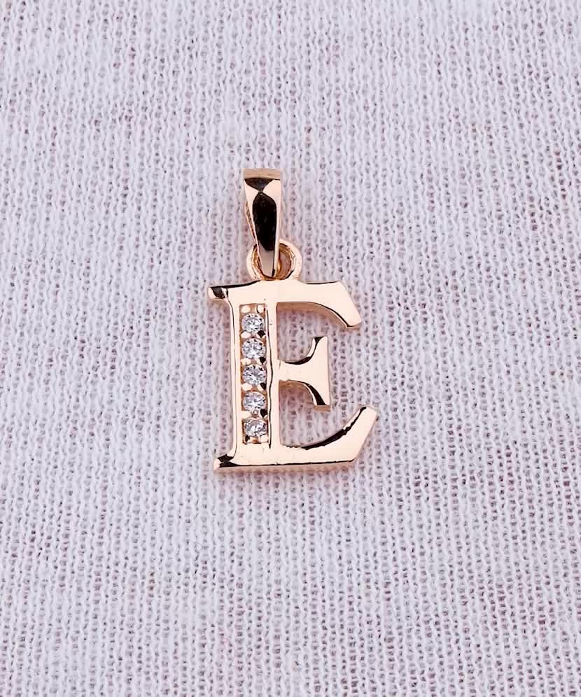Gold pendant with zircons Letter E