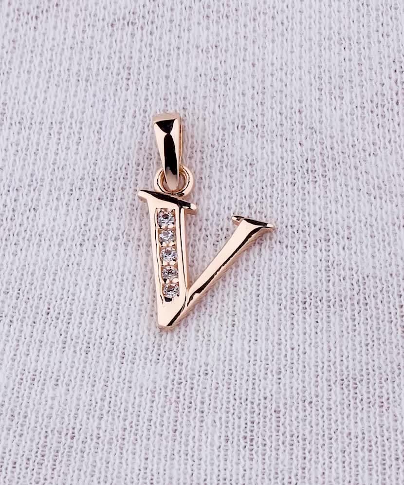 Gold pendant with zircons Letter V