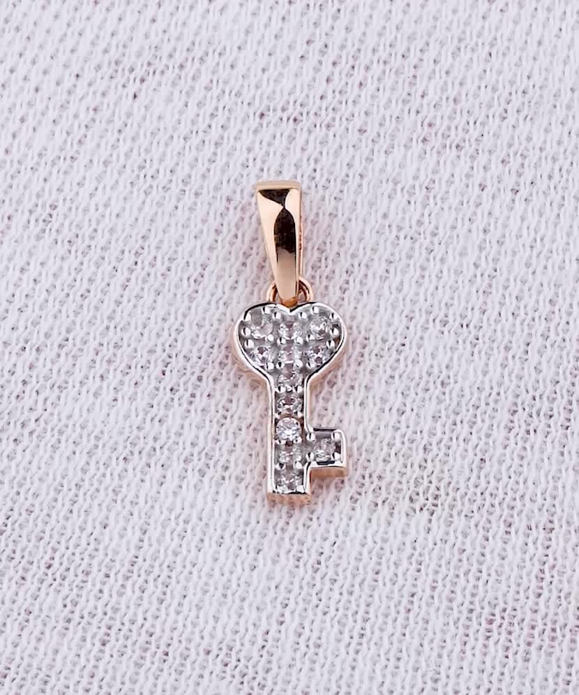 Gold pendant with zircons "Key"