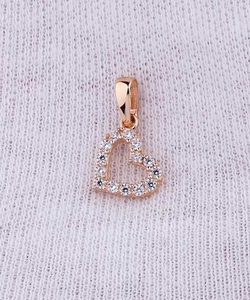 Gold pendant with zircons "heart"