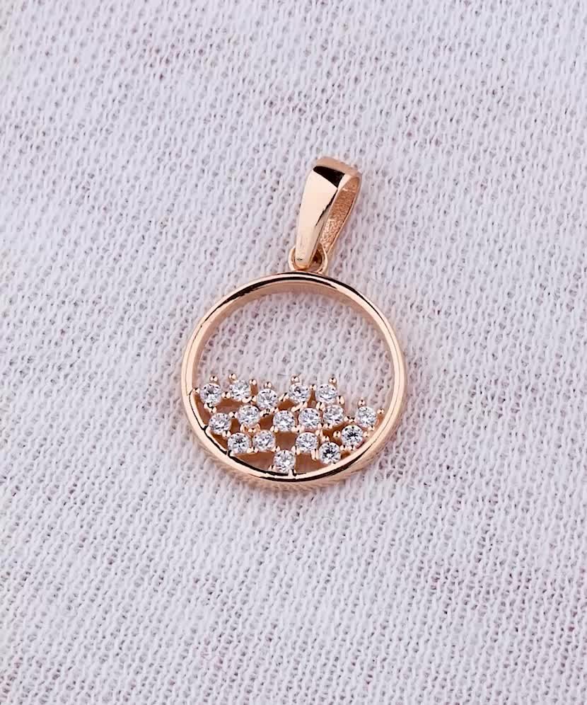 Gold pendant with zircons