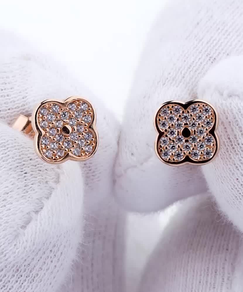 Gold earrings with zircons