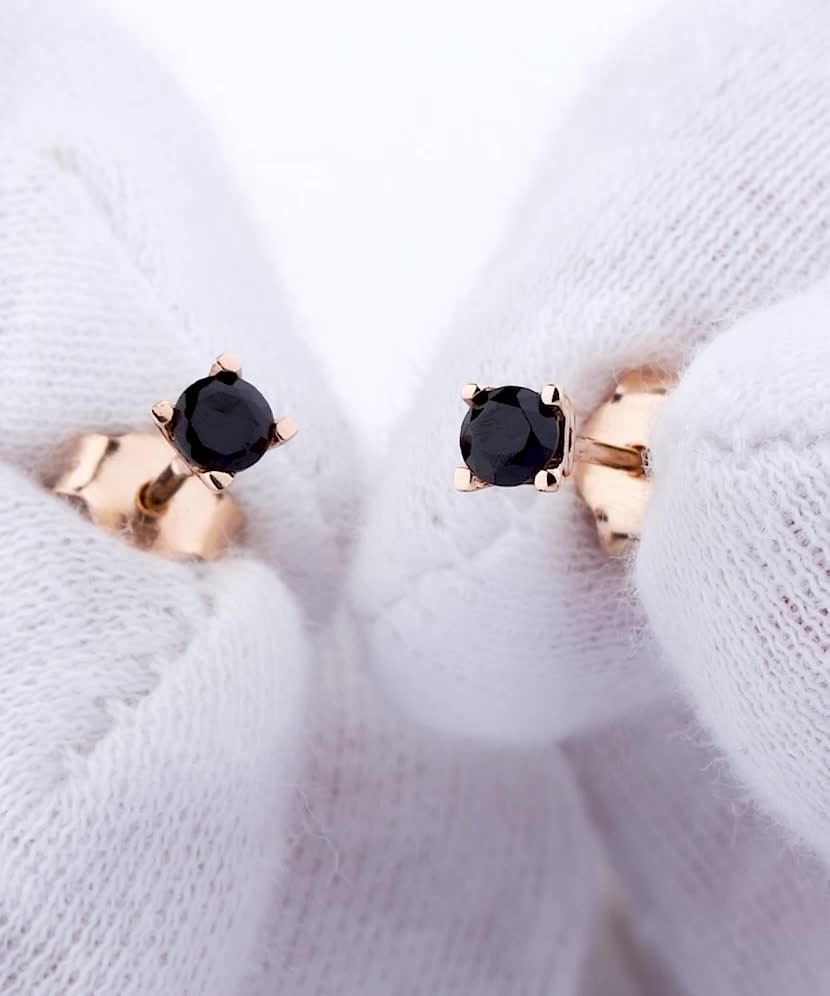 Gold earrings with zircons