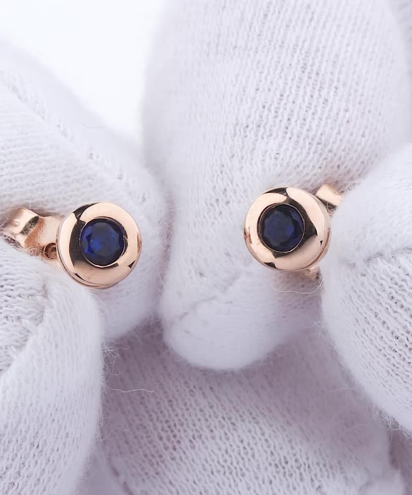 Gold earrings with zircons