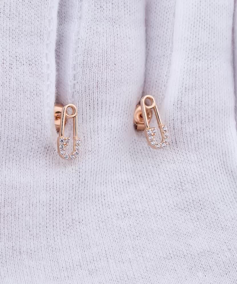 Gold earrings with zircons