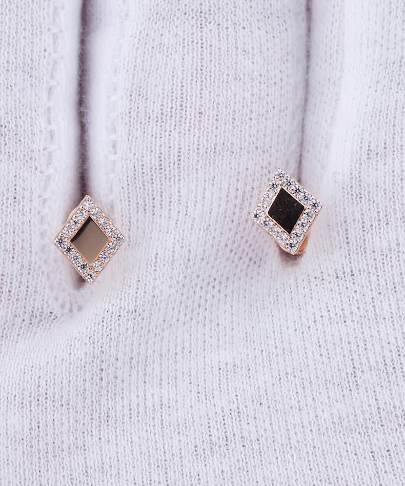 Gold earrings with zircons