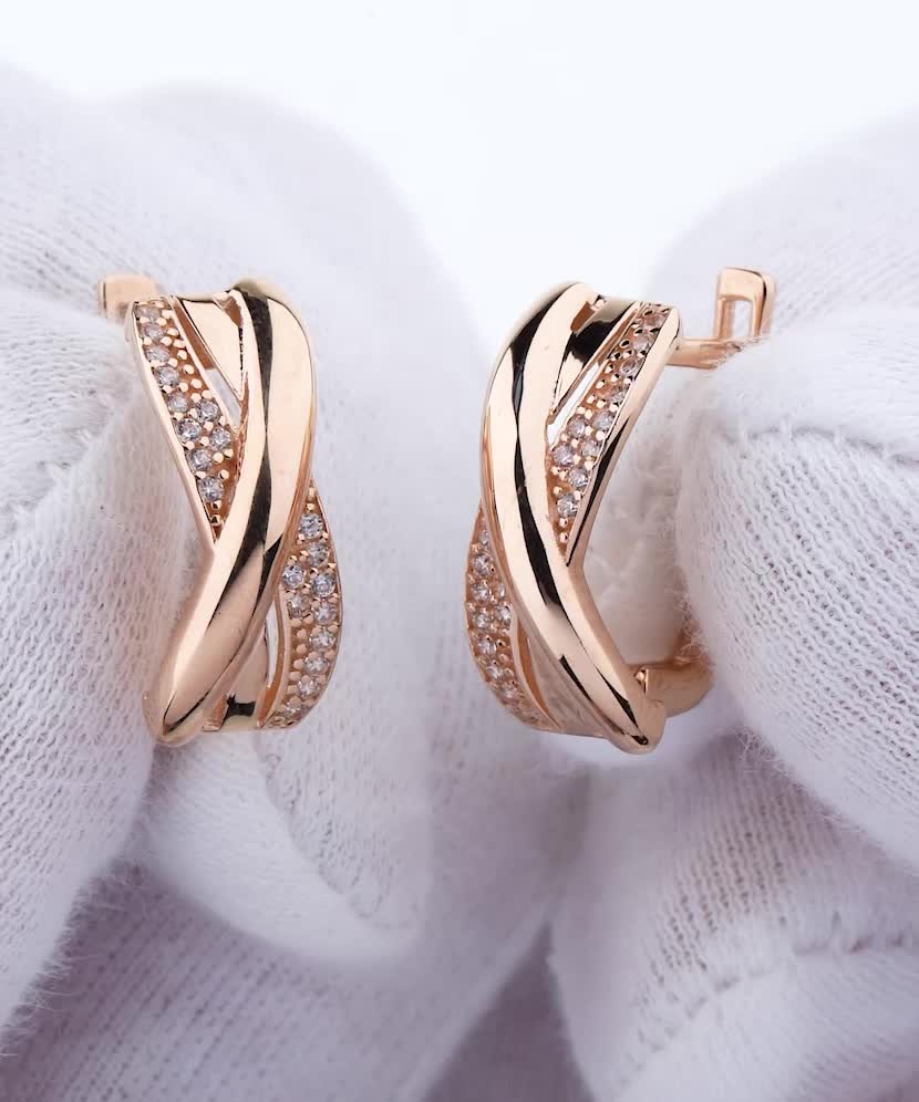 Gold earrings with zircons