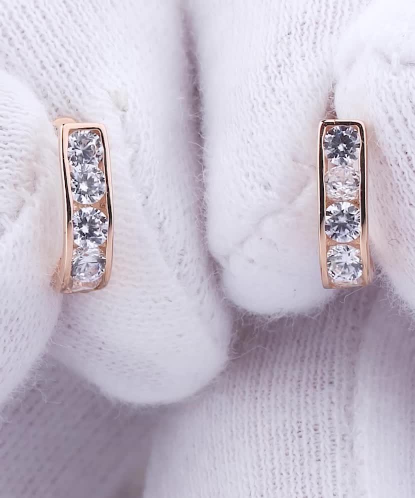 Gold children's earrings with zircons