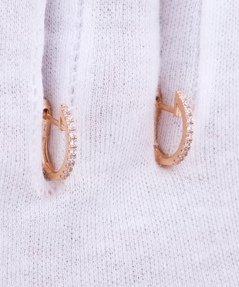 Gold earrings with zircons