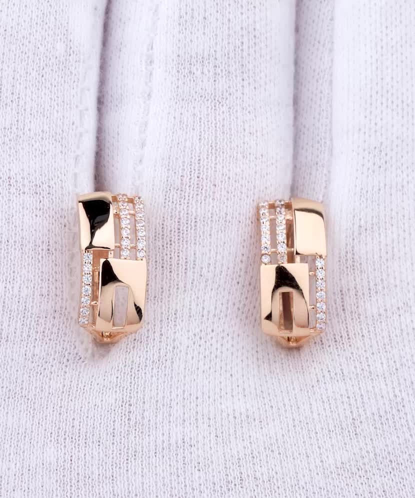 Gold earrings with zircons