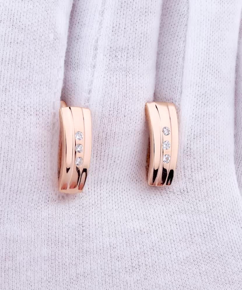 Gold earrings with zircons