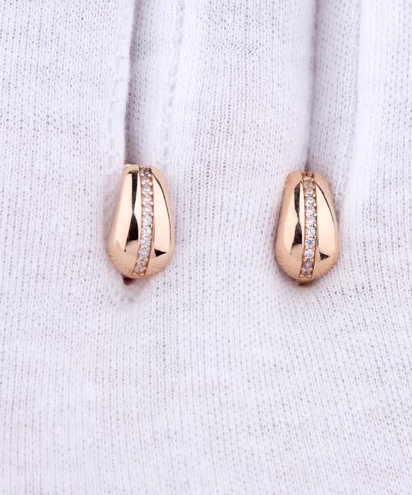 Gold earrings with zircons