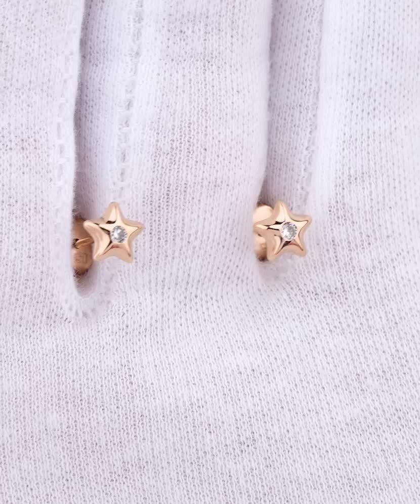 Gold earrings with zircons "stars"