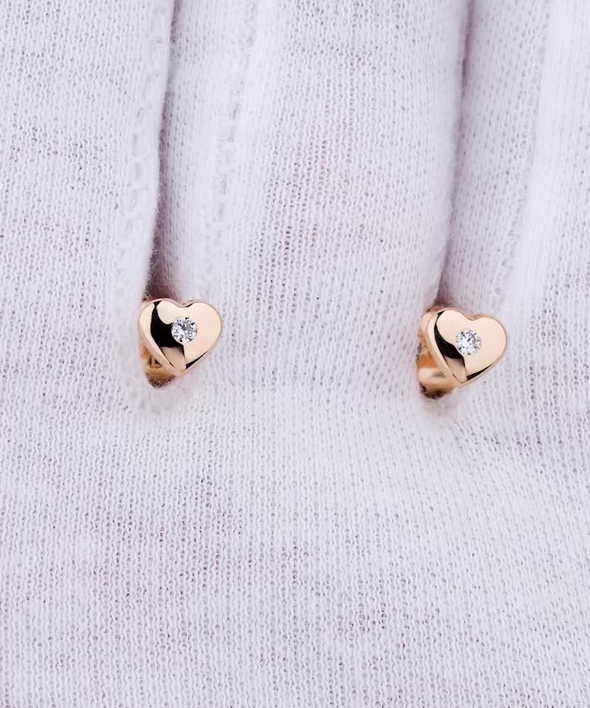 Gold earrings with zircons "hearts"