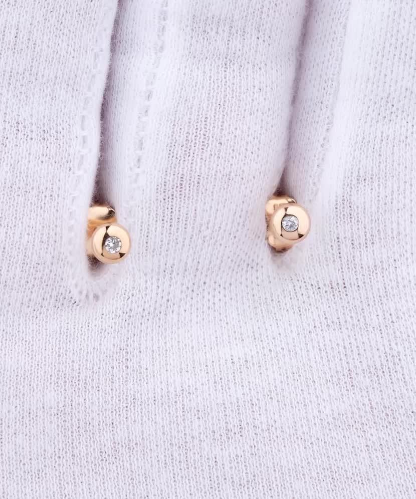 Gold earrings with zircons