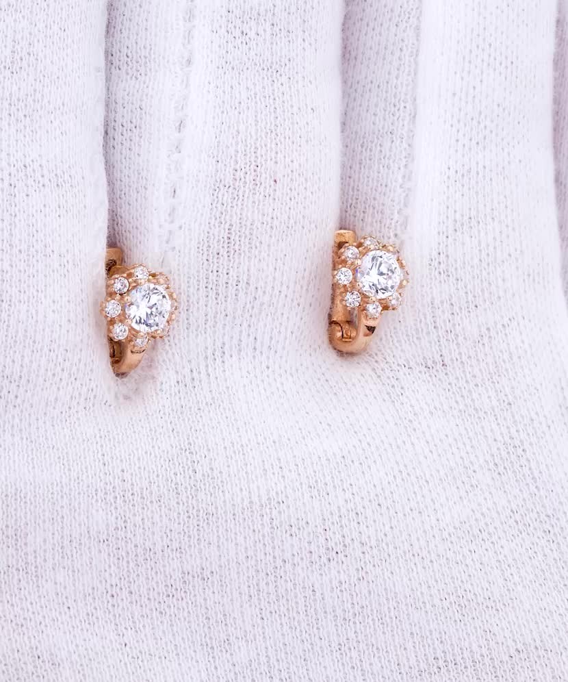 Gold earrings with zircons