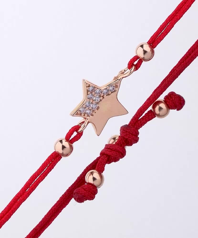 Red string bracelet with a gold pendant and zirconium "Star"