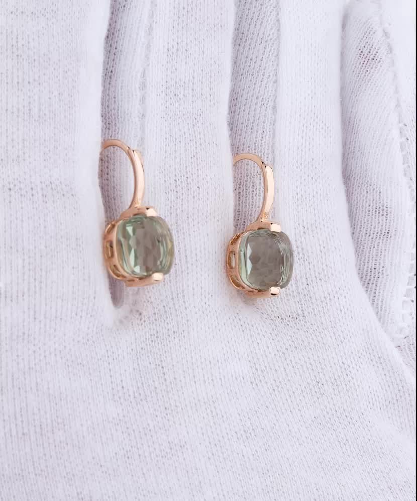 Gold earrings with green amethysts