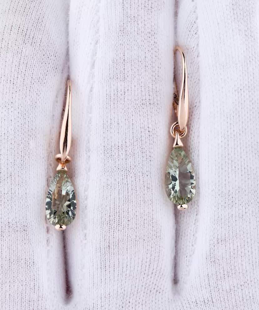 Gold earrings with green amethysts