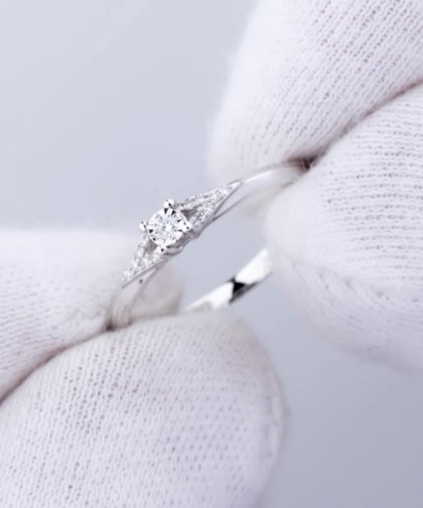 White gold ring with diamonds