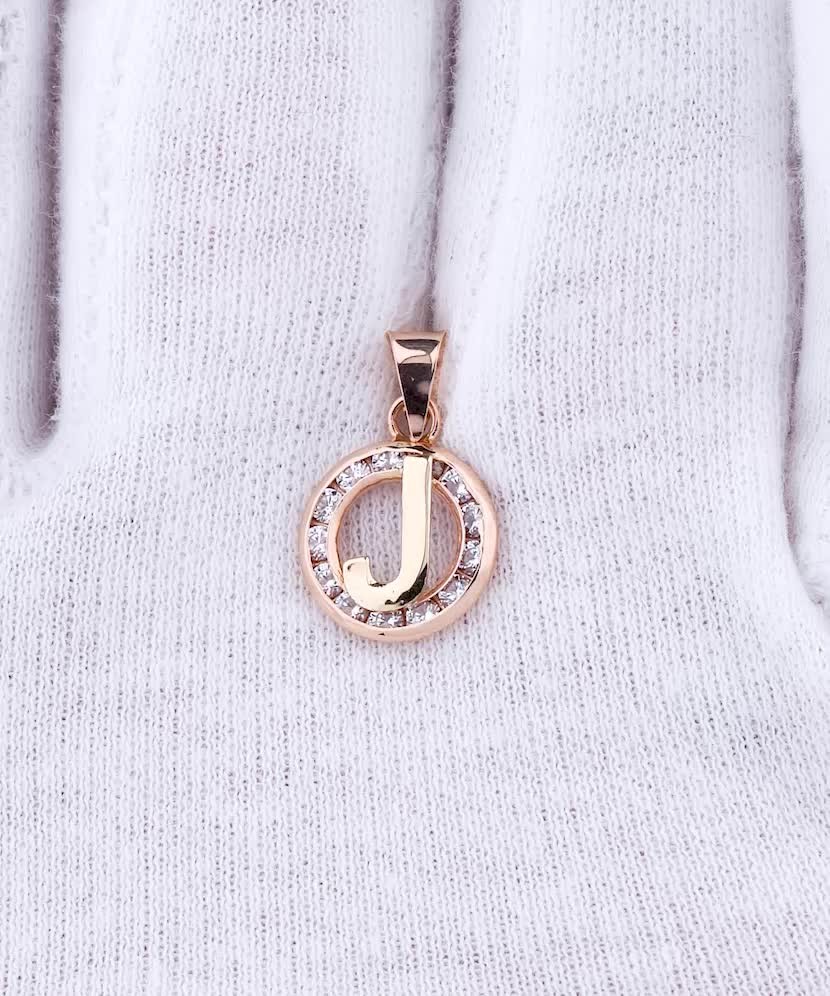 Gold pendant with zircons Letter J