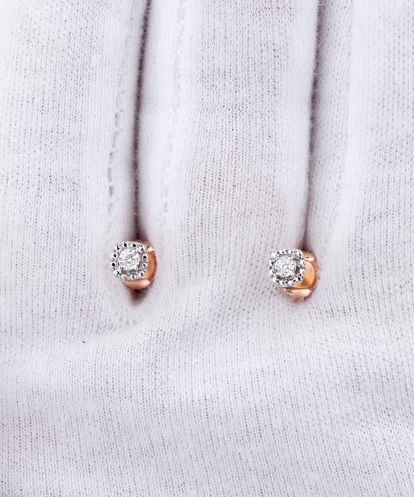 Kultaiset korvakorut timanteilla