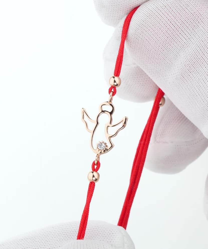 Red string bracelet with gold pendant "angel"