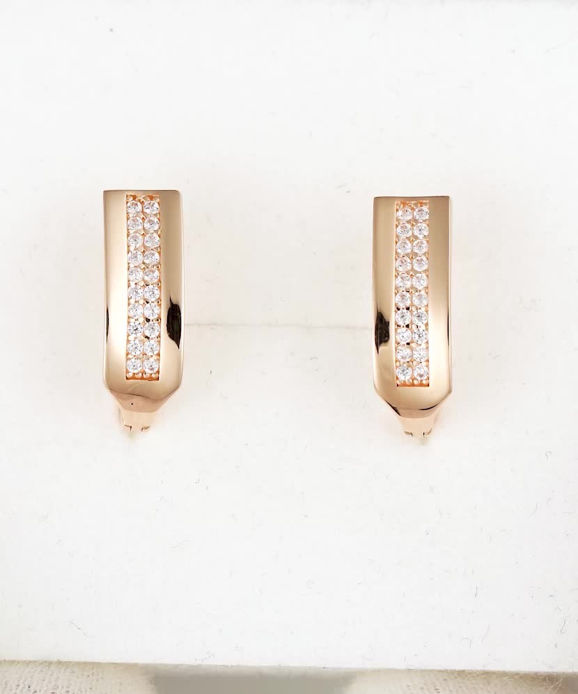 Gold earrings with zircons