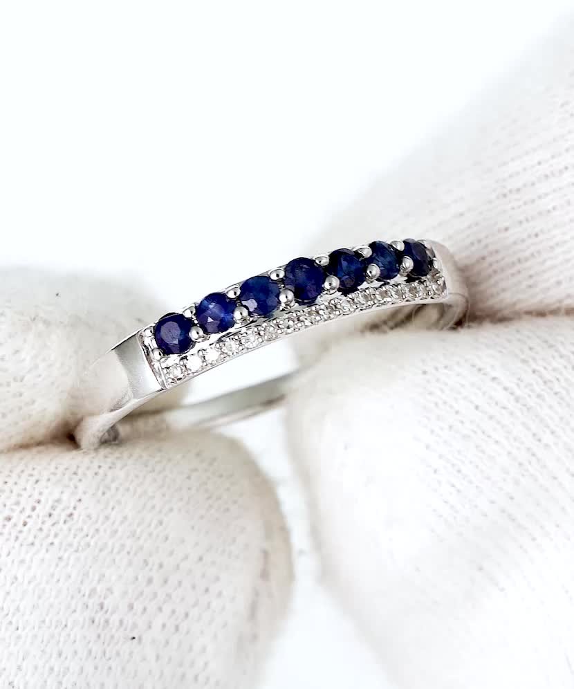 White gold ring with sapphires and diamonds