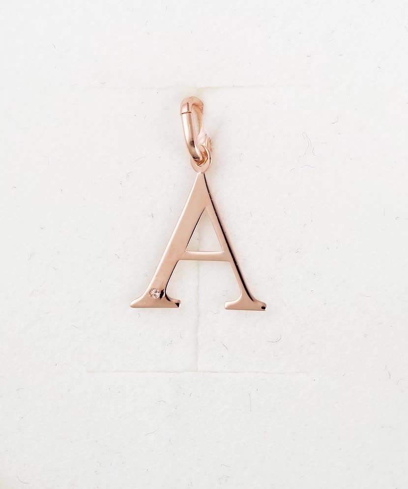 Gold pendant with diamond letter A