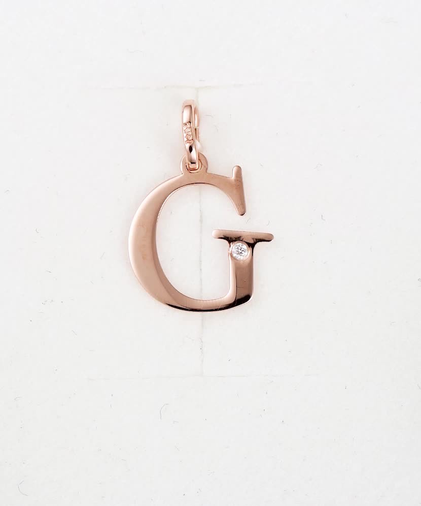 Gold pendant with diamond letter G