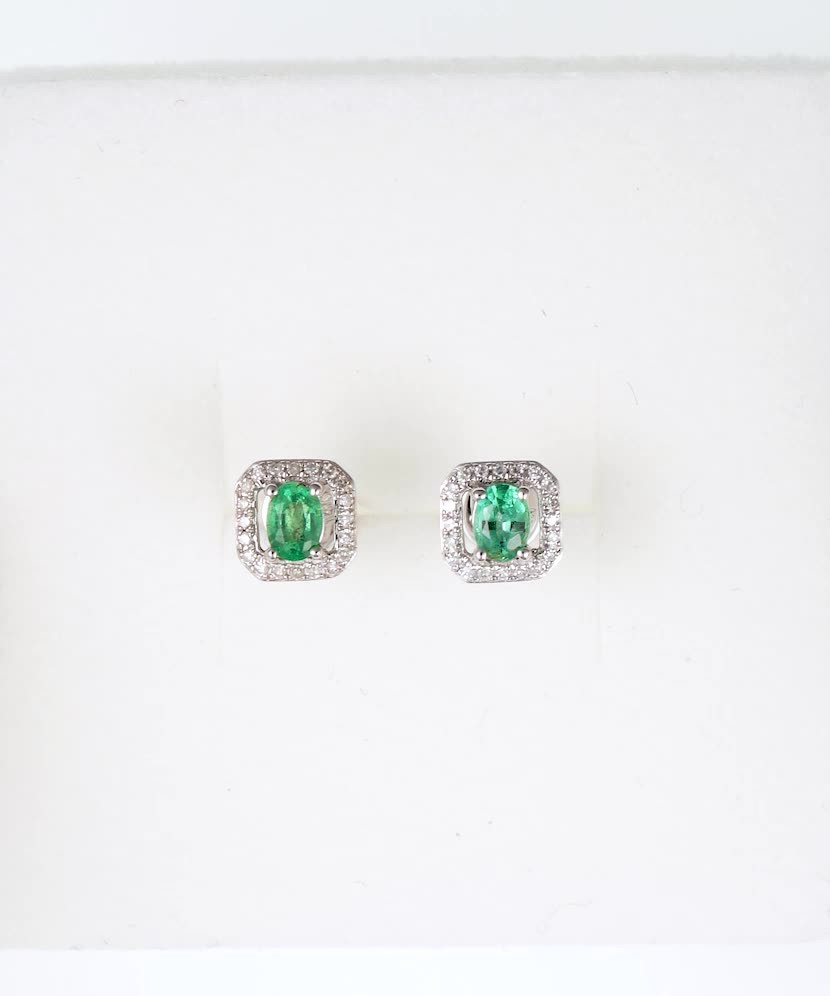 White gold earrings with emeralds and diamonds